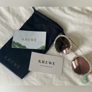 Krewe Sunglasses. Style: Chartres. Color:Gold frames with multicolor acetate.